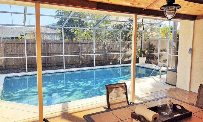 Villa De Palmas House | Beautiful Beach Style Home by Port Canaveral w/Private Salt Water pool