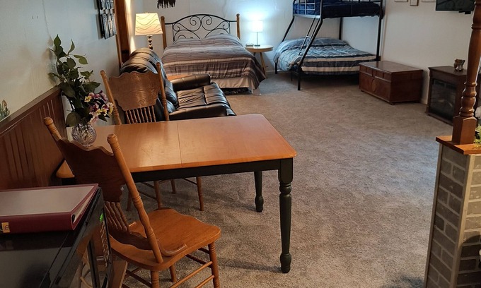 Shore House | Beautiful cabin situated on wooded land with nice yard clearing and small stream