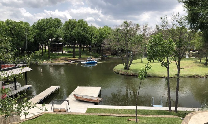 Marble Falls House | Beautiful Farmhouse Waterfront Cove with Dock and Hot Tub.