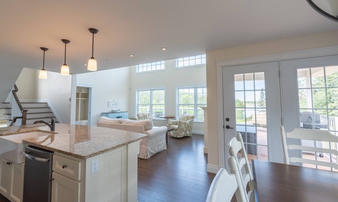 Stanley Bridge House | Beautiful four bedroom home with waterview, outdoor hot tub, and fire pit