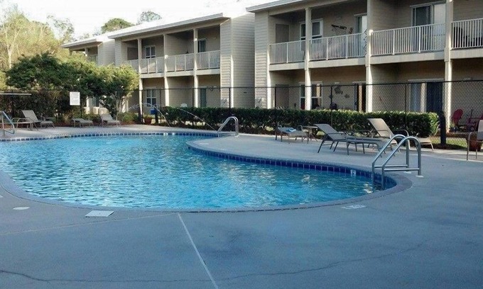Gulf Shores Condo | Beautiful Furnished In the Courtyard, Right Beside The Pool On 1st Floor