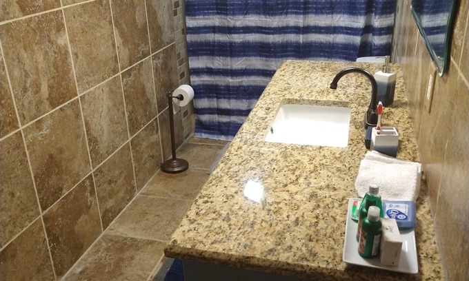 Hutto House | Beautiful home away from the city. Room is cozy and comfortable.