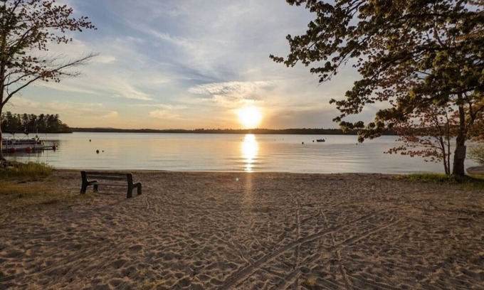 Raymond House | Beautiful home with 150ft sandy beach and private boat launch on Big Sebago!