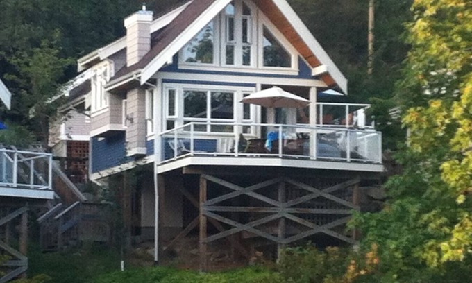 Pender Island Cottage | Beautiful modern cottage with fireplace and large deck at Currents at Otter Bay.
