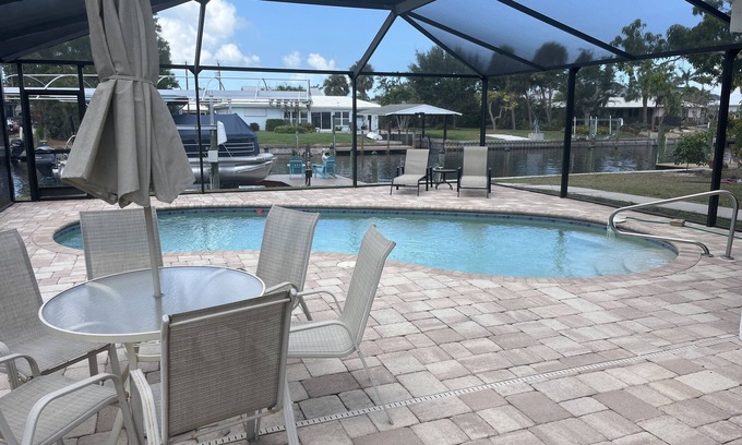Bokeelia Apartment | Beautiful pool home on canal with 45-foot boat dock. 10 minutes to Gulf by boat.
