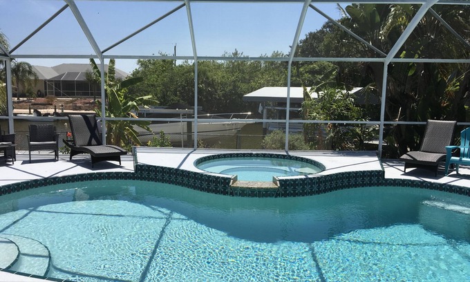 South Gulf Cove House | Beautiful relaxing waterfront home with pool, spa and boat dock.