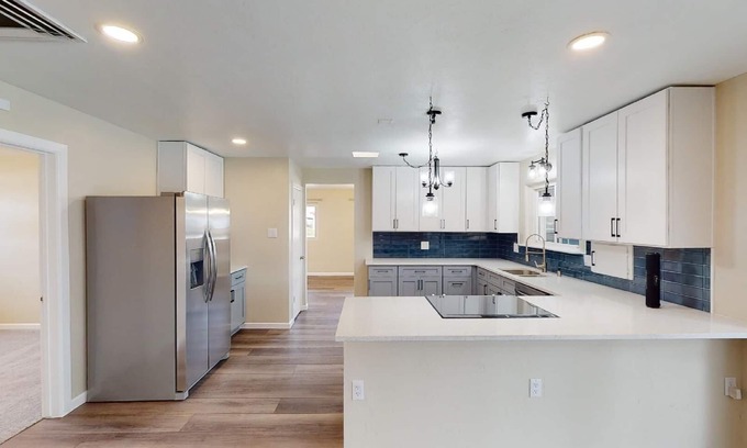 Uptown House | Beautiful Remodeled Single Family Home Near Freeway Access Shopping and Dining