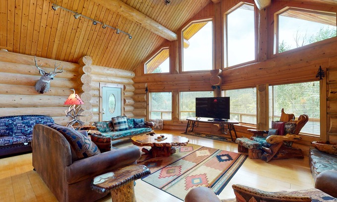 San Juan River Village Cabin | Beautiful Riverfront Log Cabin with Mountain Views, Firepit, and Gas Grill