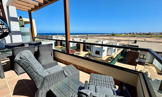Caleta de Fuste Apartment | Beautiful south facing penthouse apartment with amazing views in Caleta de Fuste