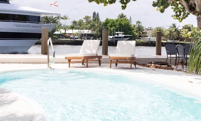 Cypress Point Condo | Beautiful Waterfront Condo on Canal with Pool & Walk to Beach! Boat Watch! 2b/2b