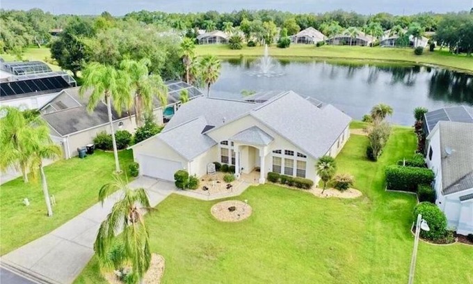 Sunridge Woods House | Beautiful Waterfront Home with Heated Pool and Game Room
