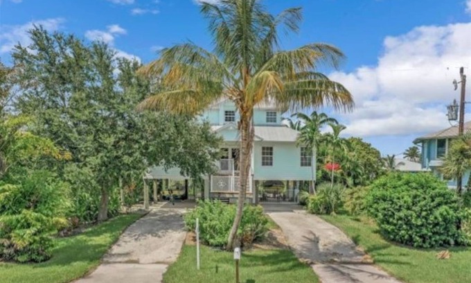 Pine Island Center House | Beautiful waterfront Key West style home with a pool