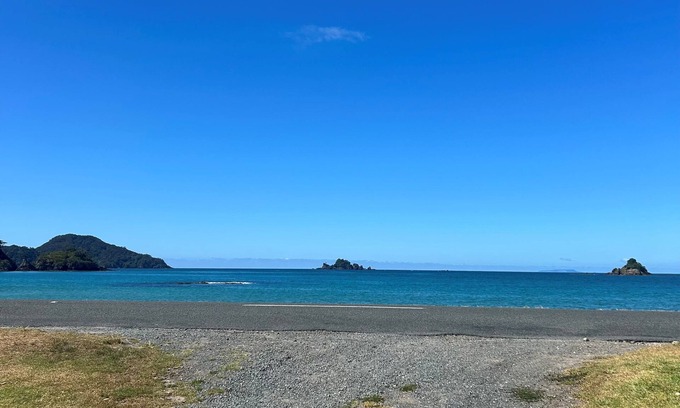 Oakura House | Beautifully renovated 5-bedroom bach just steps from the sand.