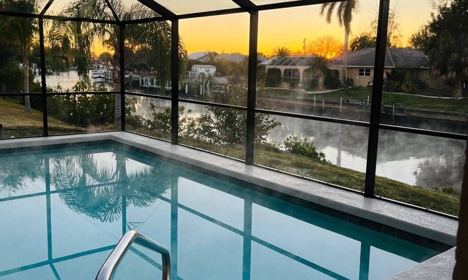 Harbour Heights House | Beautifully updated home on canal with heated pool - no additional charge.