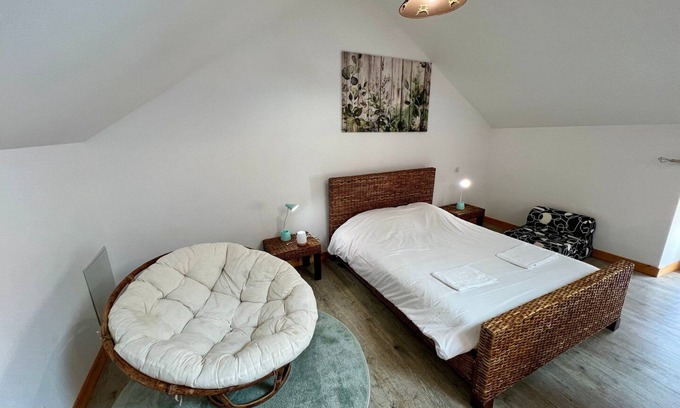 Lussac-les-Chateaux Apartment | Bedroom is a cosy house