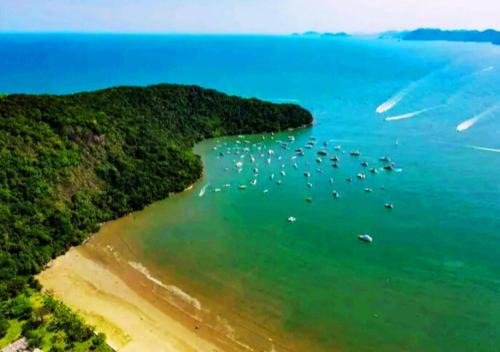 Indaia Apartment | Beira Mar, Conforto e Infra de Resort em Bertioga SP