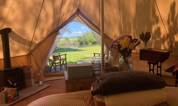 Washford Cabin | Bell tent in ultimate luxury with a wood fired hot tub, super king size bed
