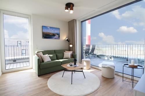 Marienleuchte Apartment | BeltBlick 11 – Ferienwohnung mit unverbautem Meerblick & Dachterrasse!