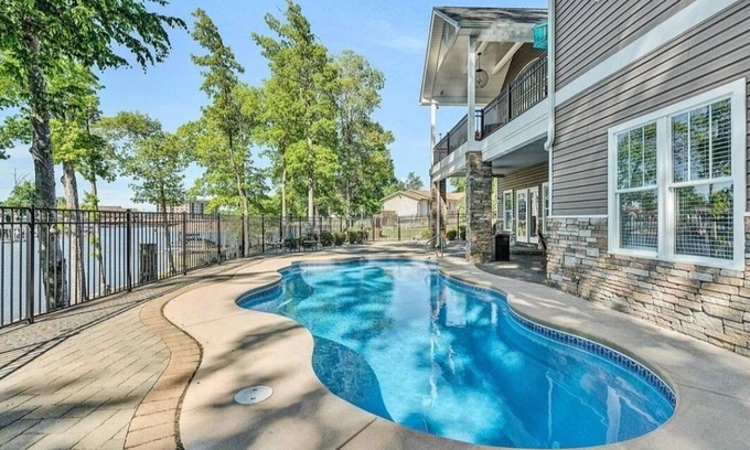 Westlake Corner House | BEST location on Smith Mtn lake! Waterfront home w POOL & Dock in no wake zone.