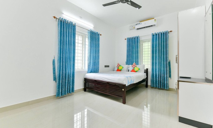 Kochi Apartment | Bethel Gardens Top View provides you a comfy stay in the middle of foliage.