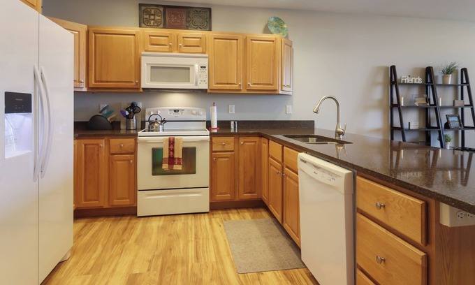 Frankfort Apartment | Betsie Harbor Lodging- Unit 1. Spacious apartment with access to Main Street