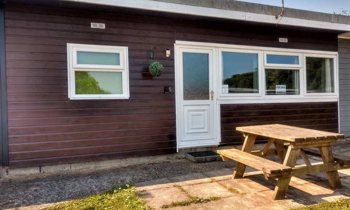 Bucks Cross Ski Chalet | Bideford Bay Buck's Cross Devon chalet own patio on well maintained holiday park