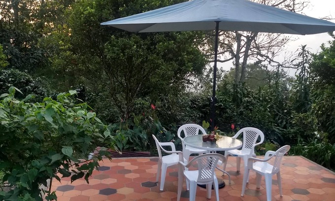 El Rosal Cabin | Bio-Hotel Bhakti,nCoffee rural cabin with view of the mountains and the forest