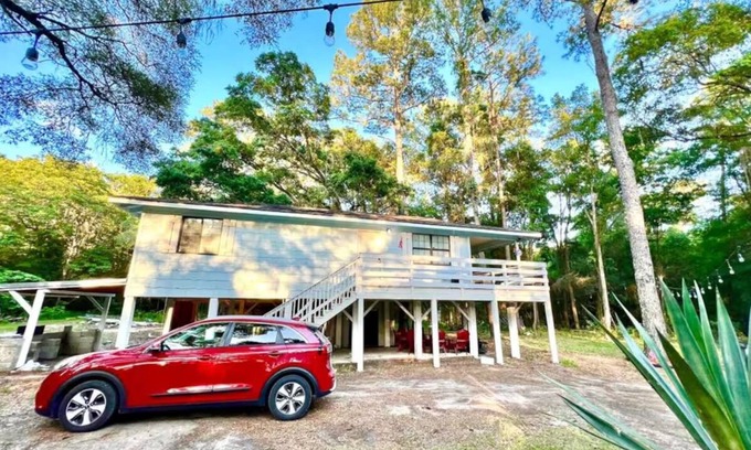 Fellowship House | Blue Sky StiltsHouse in a Secluded Forest.