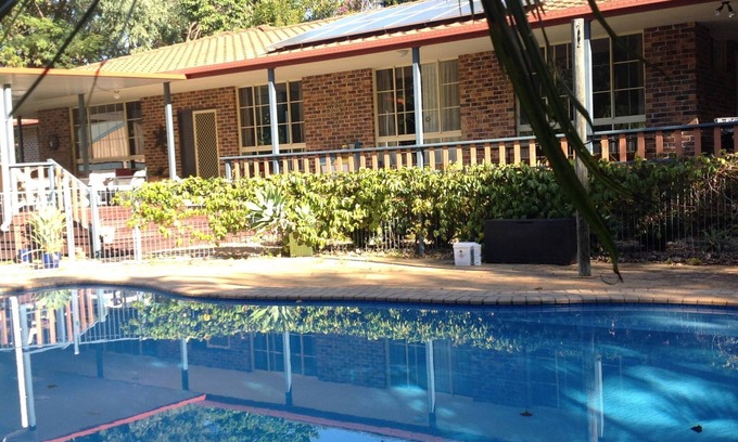 Boambee House | Boambee Retreat - 4 Bedroom Home with Pool near Beach sleeps 8