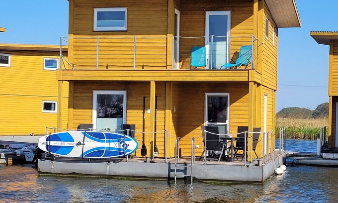 Ostvorpommern Boat Rental | Boat 'Floating House' with Lake View, Private Terrace and Wi-Fi