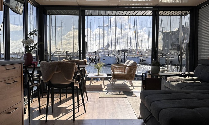 Heiligenhafen Boat Rental | Boat 'Hausboot Mit Motorboot' with Sea View, Terrace & Wi-Fi