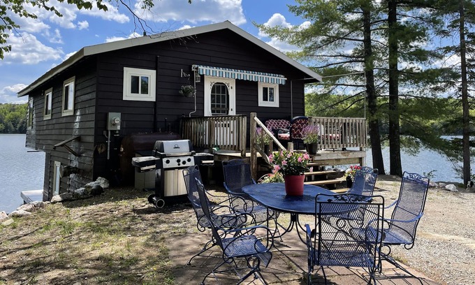 Novar Cottage | Boathouse Cottage on the water, access to snowmobile trails and ice fishing.