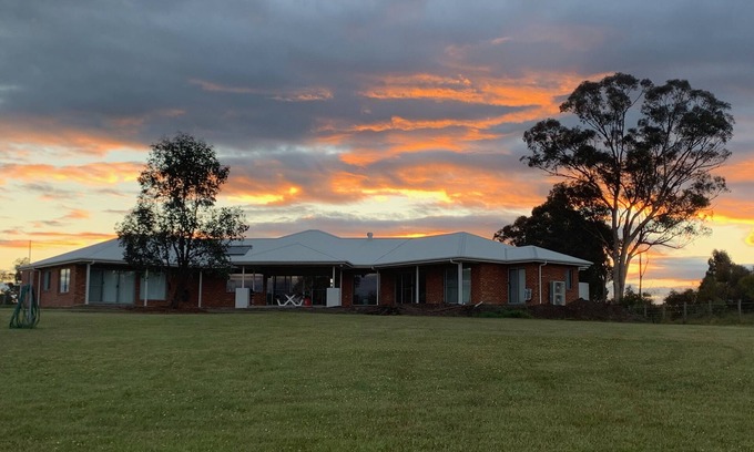 Kirwans Bridge House | Bobby's is a large new family home with water frontage.