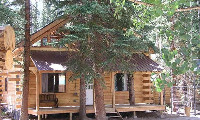 Lake City House | Bobcat Log home 4 bd 2 bth on the river waterfall view porch ATV drive-in/out