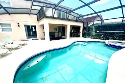 Lake Wilson Preserve House | Bohanan Villa 5 bed 3 bath with pool and jacuzzi spa
