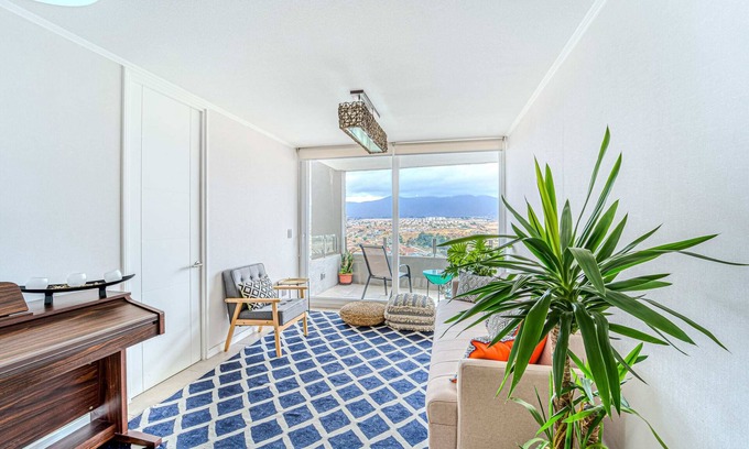 La Herradura Apartment | Bohemian Minimalist with Piano and Office