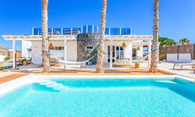 Charco del Palo Villa | Boutique Beach Villa by Lanzarote Retreats - Private Pool - 1 min walk to Sea Pool