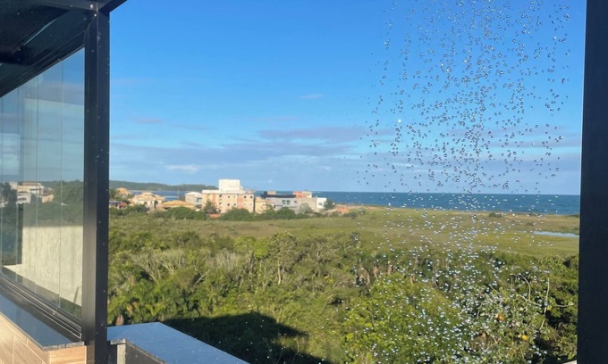 Rio das Ostras Apartment | Cozy penthouse apartment facing Rio das Ostras beach