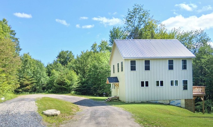 Moretown House | Brand new family home nestled in the woods close to Waterbury, Stowe, and Sugarbush with a hot tub