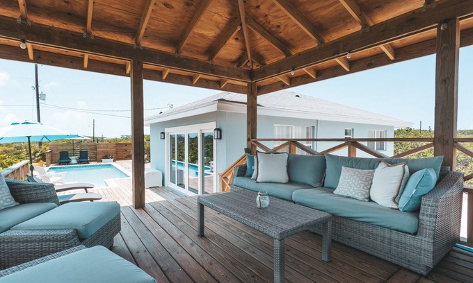 William's Town Villa | BRAND NEW* Silver Palms Retreat, Heated POOL, Deck Oasis,Tropic of Cancer Beach