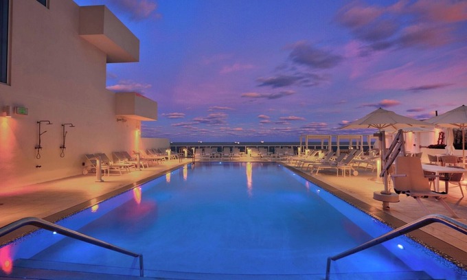 Central Beach Hotel | Breathtaking Marina Views, Pool, Near Aquatics Center & Local Attractions