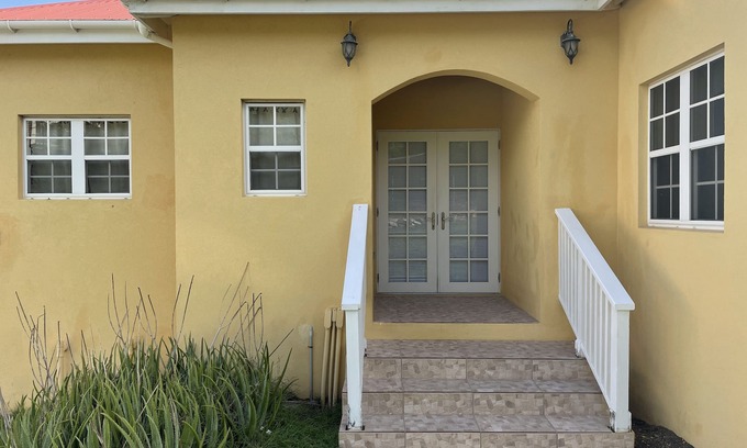Saint John Parish House | Breezy hillside executive house with great views near to St. Johns City