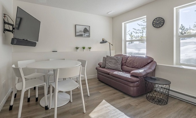 Silver Star Mountain Apartment | Bright 1 Bedroom Plus Private Den - modern suite with BBQ, pet friendly!