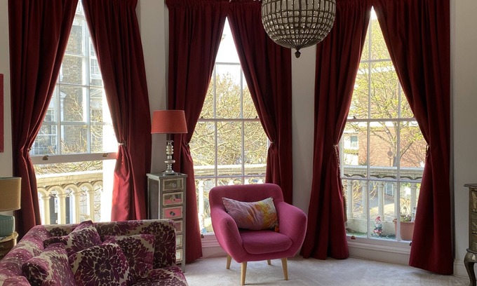 Warwick Apartment | Bright and airy studio apartment with balcony.