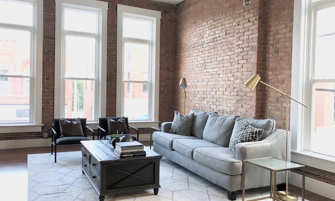 Paola Apartment | Bright and Spacious Historic Brick Loft off the square in Paola