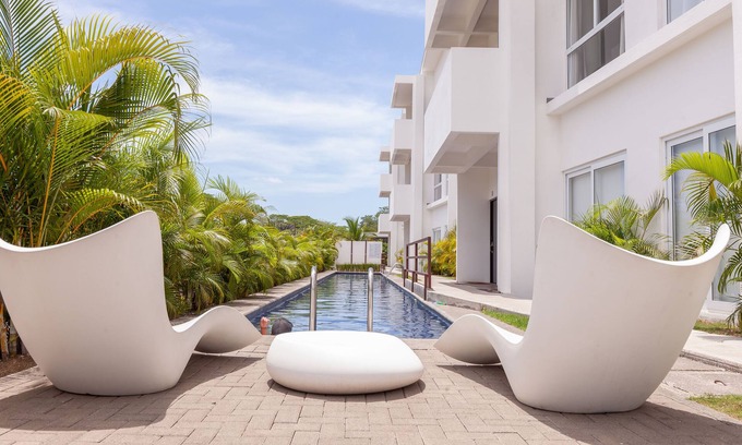 Jaco Apartment | Bright and stylish new condo, 5 min walk to the beach.