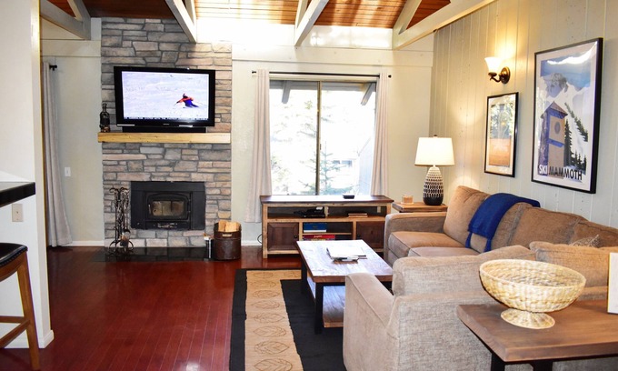 Mammoth Lakes Condo | Bright corner condo overlooking the pool, #154 is steps from the shuttle