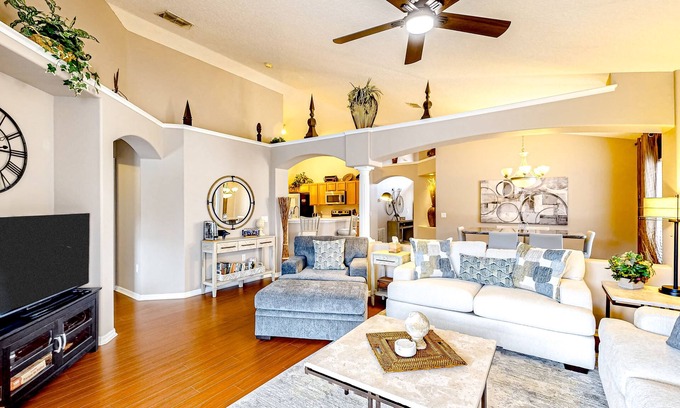 Eagle Pointe South House | Bright home with an enclosed pool, patio, Ping-Pong table, foosball, and AC