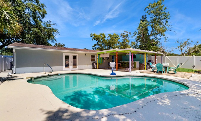 Pinellas Park House | Bright Home with Private Pool, High-Speed WiFi, Firepit, Outdoor Bar, and Grill