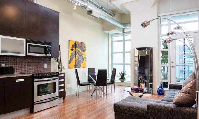 Midtown Toronto Condo | Bright loft one bedroom with den, steps to subway, Casa Loma and Yorkwille